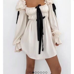 Rumored Cream Babydoll Dress with Ruched Bishop Sleeves